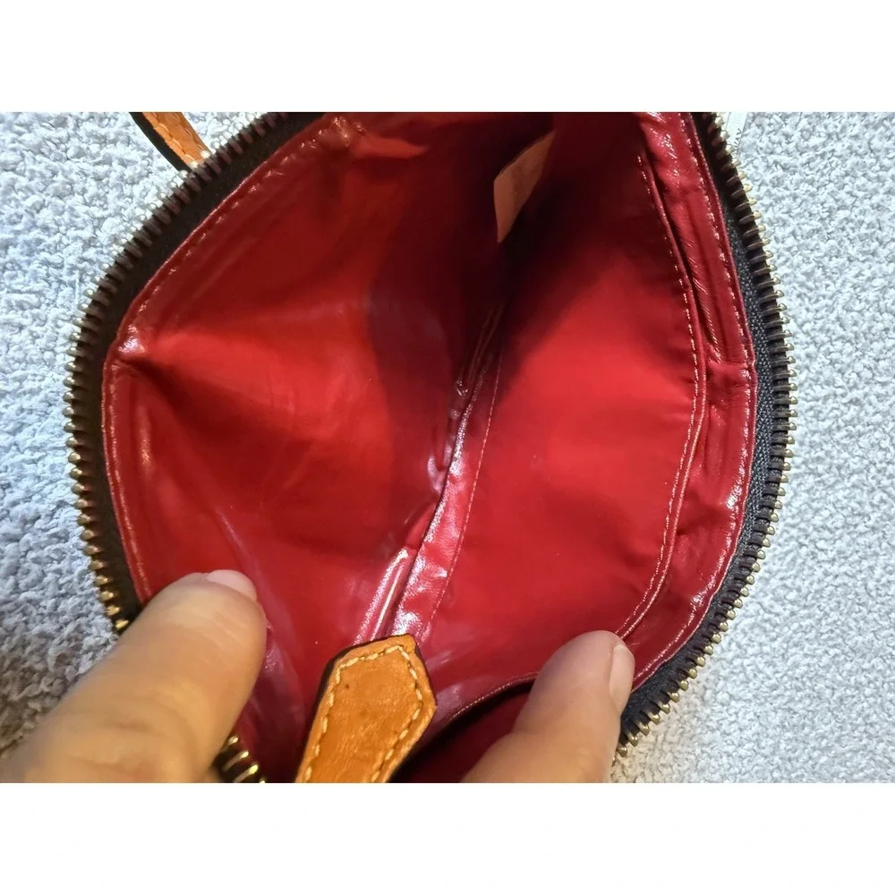 Dooney & Bourke Women's Wristlet Orange Pebbled Leather Large Slim Purse